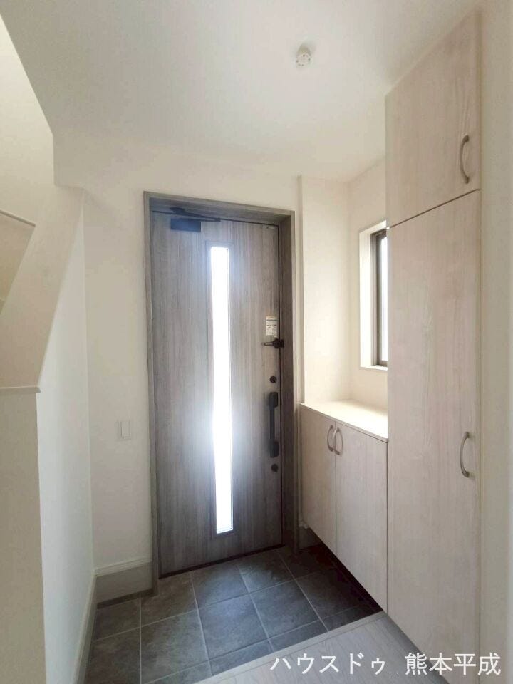 統一感のある色合いの玄関です