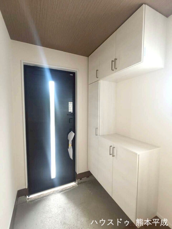 統一感のある色合いの玄関です