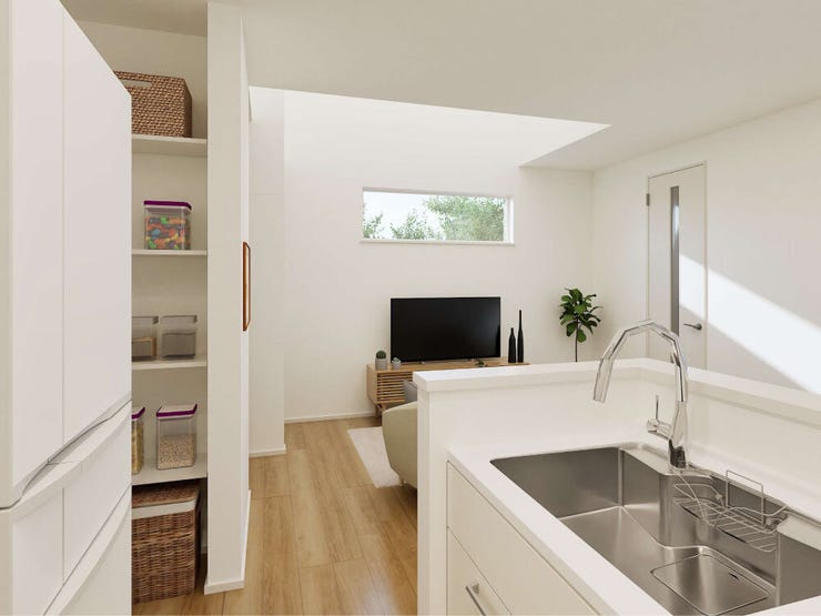 3面に窓を設けたことで光がたっぷり入り、吹き抜けと合わさって実際以上に広がりを感じられる、明るく開放的なLDKです。