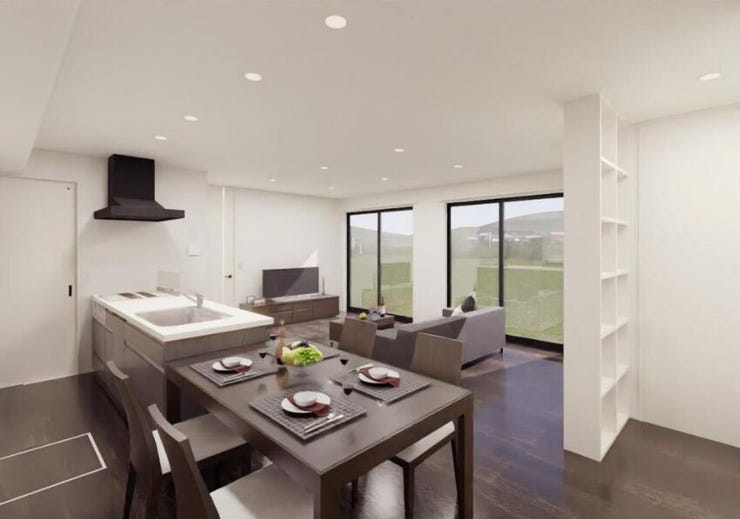 23.8帖のゆとりあるリビングは、オープンキッチンと美しくつながることで、空間全体に一体感と開放感が生まれています。窓から差し込む明るい光が室内をやさしく包み込みます。