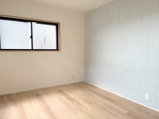 淡いブルーのアクセントクロスが可愛いお部屋です