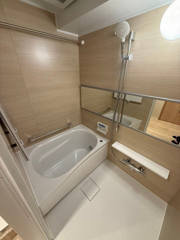 落ち着いた色味のパネルを採用し、リラックスできる空間に仕上げました。