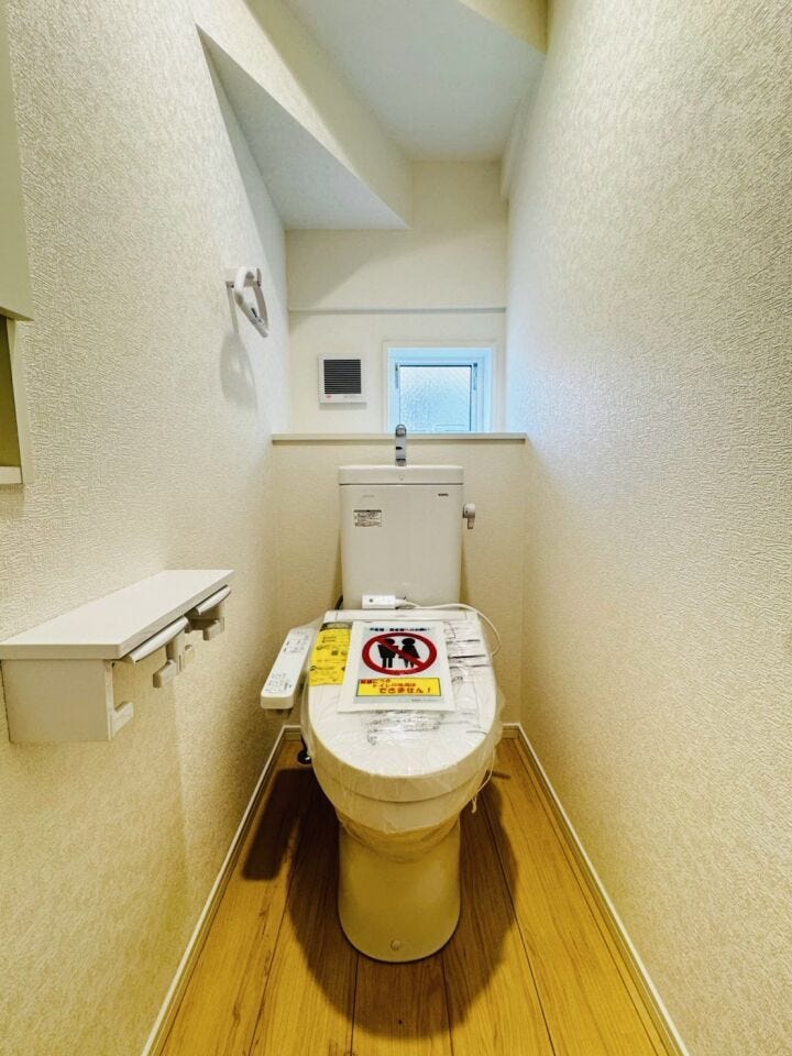 1F 温水洗浄便座