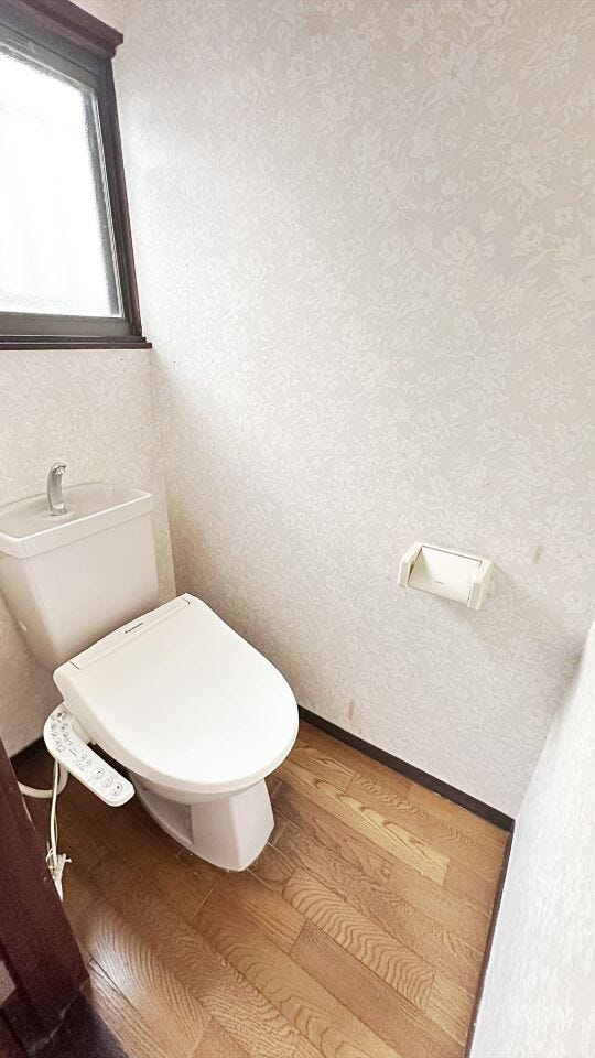 清潔感と落ち着いた雰囲気を演出したトイレ空間
