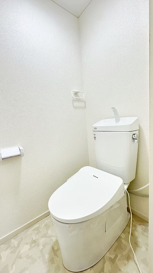 清潔感と落ち着いた雰囲気を演出したトイレ空間