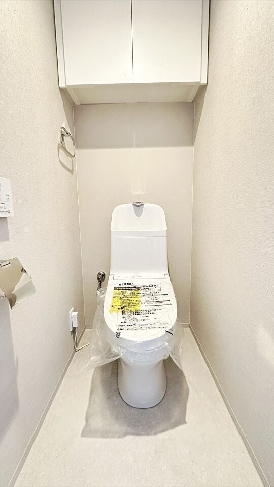 清潔感と落ち着いた雰囲気を演出したトイレ空間