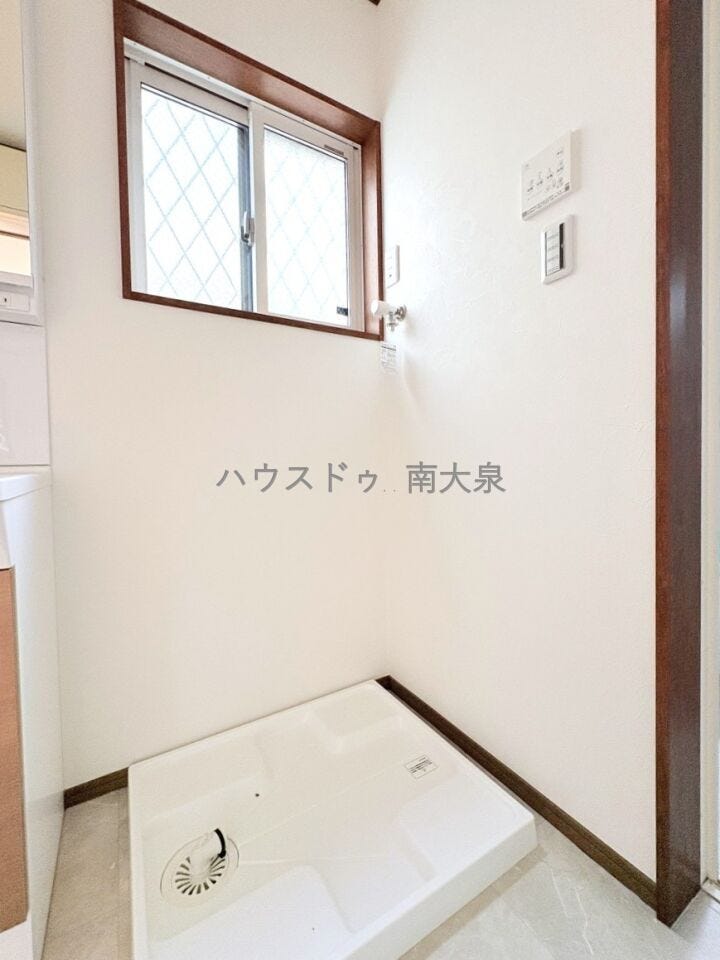 ●1階洗面室/洗濯機置場