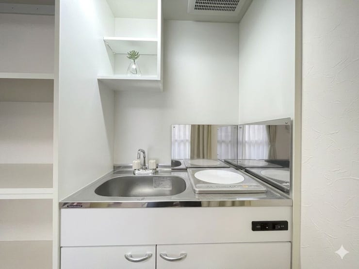 1階洋室に設置されているミニキッチン。
※居住中の為、一部荷物など消しております。