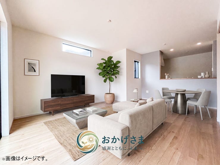 【リビング】
【リビングダイニング】
明るい色のフローリングとグレーのアクセント壁が調和した、スタイリッシュなリビングダイニング。