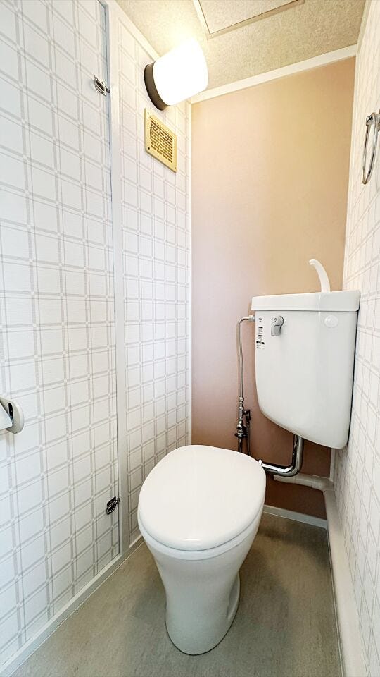清潔感と落ち着いた雰囲気を演出したトイレ空間