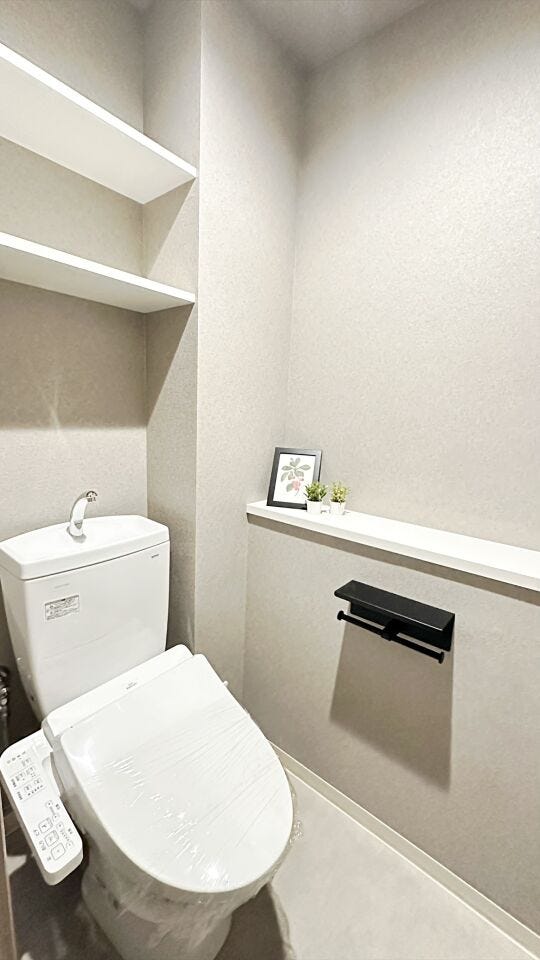 清潔感と落ち着いた雰囲気を演出したトイレ空間