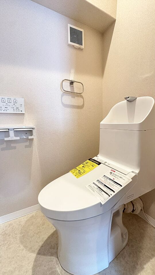 清潔感と落ち着いた雰囲気を演出したトイレ空間