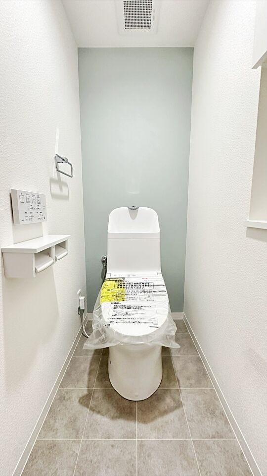 清潔感と落ち着いた雰囲気を演出したトイレ空間