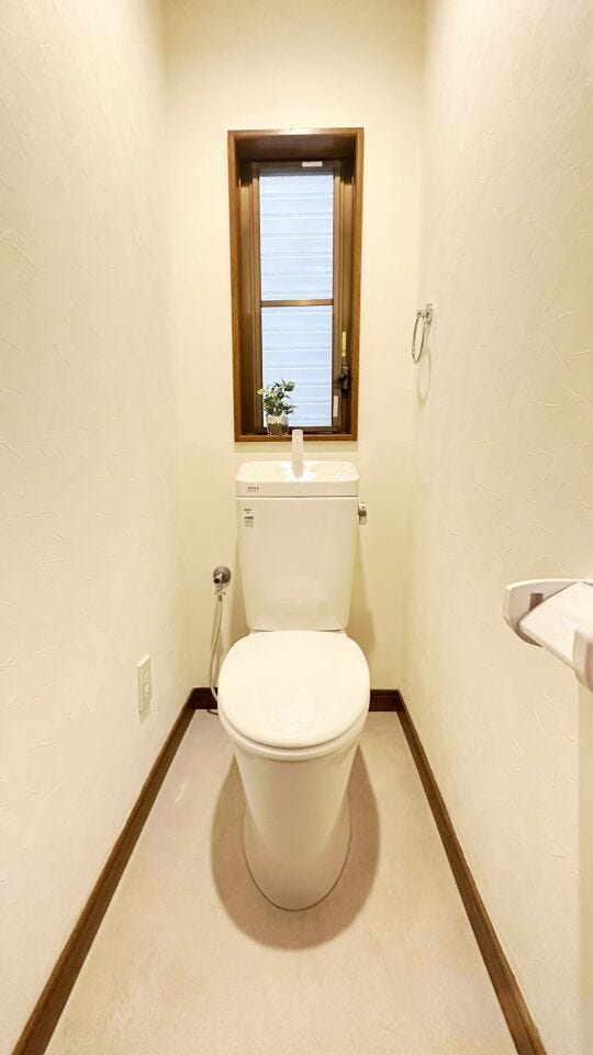 清潔感と落ち着いた雰囲気を演出したトイレ空間