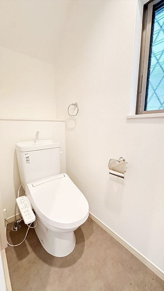 清潔感と落ち着いた雰囲気を演出したトイレ空間
