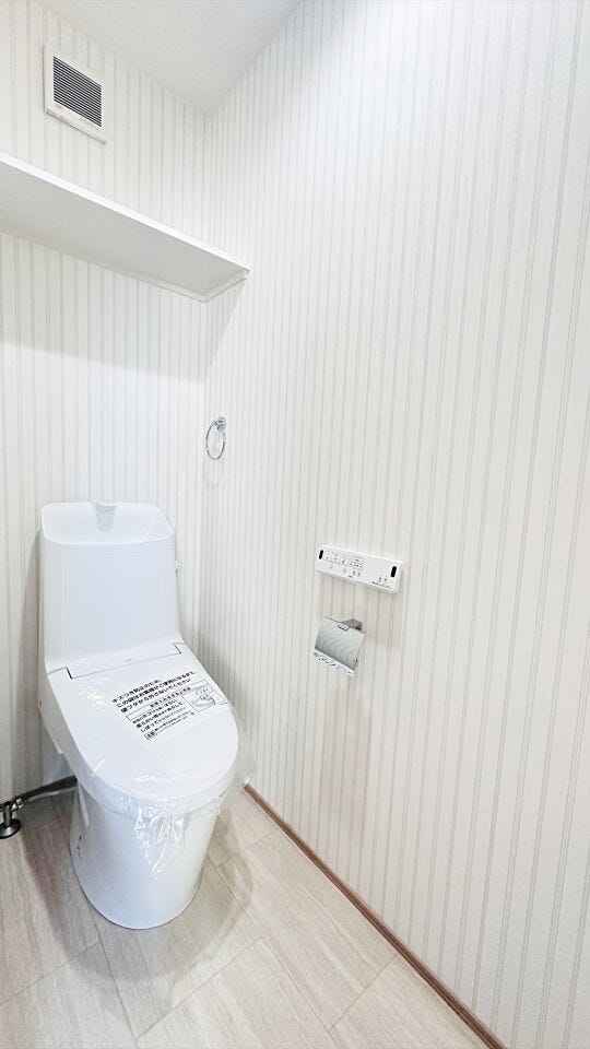 清潔感と落ち着いた雰囲気を演出したトイレ空間